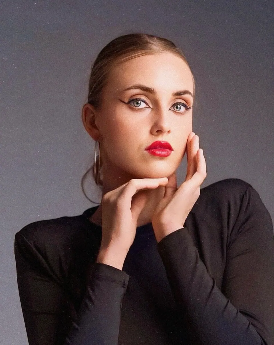 Paula Maria Rosalia in a black studio beauty portrait